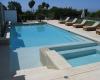 进入墨西哥Casa La Quinta的三个露台和一个游泳池