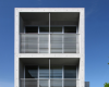 房产信息：由AtelierHAKOArchitects设计的带有模板孔的混凝土房屋