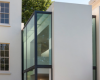房产信息：GuardTillmanPollock的房屋扩建具有垂直的玻璃片