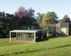 房产信息：霍尼曼史密斯建筑师为澳大利亚农舍增添了一个山坡拥抱